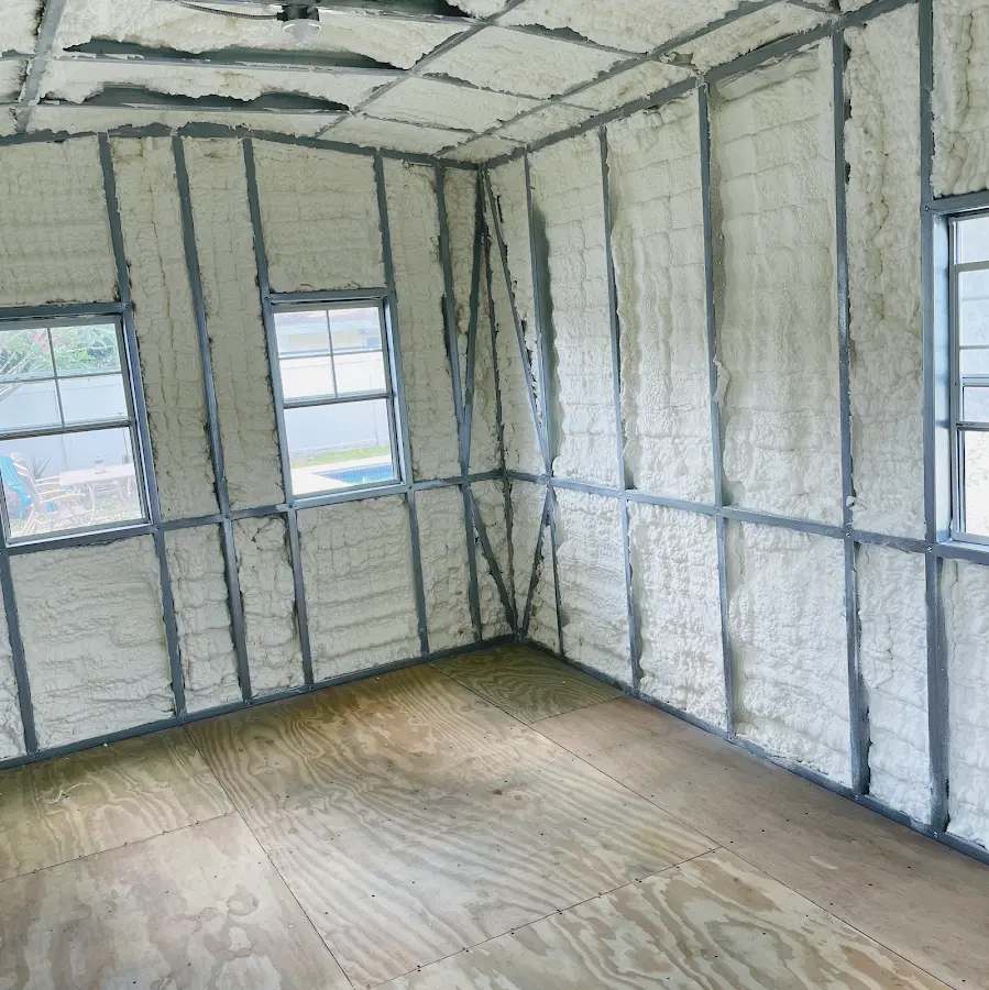 Closed-cell spray foam insulation applied to wall cavities in a residential project in Jacksonville